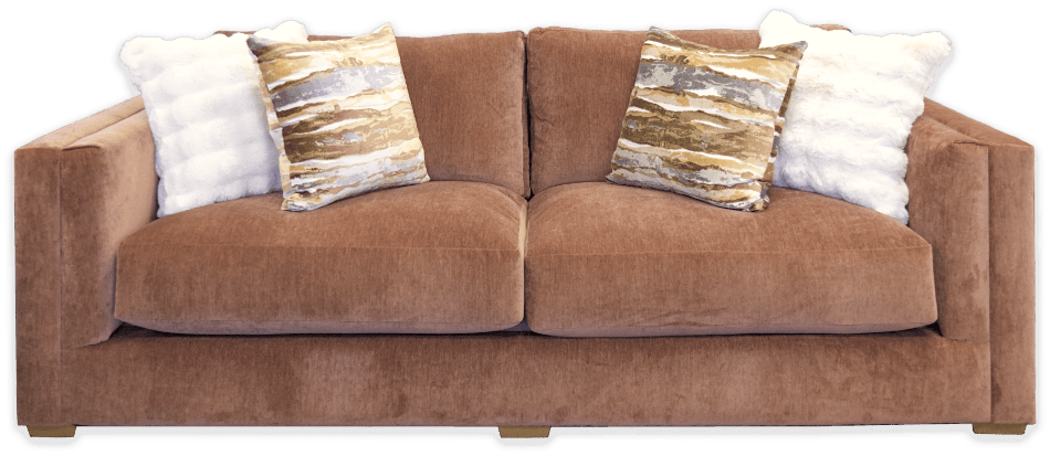 Plush rust red custom sofa adorned with patterned pillows, designed to reflect your style and attitude.