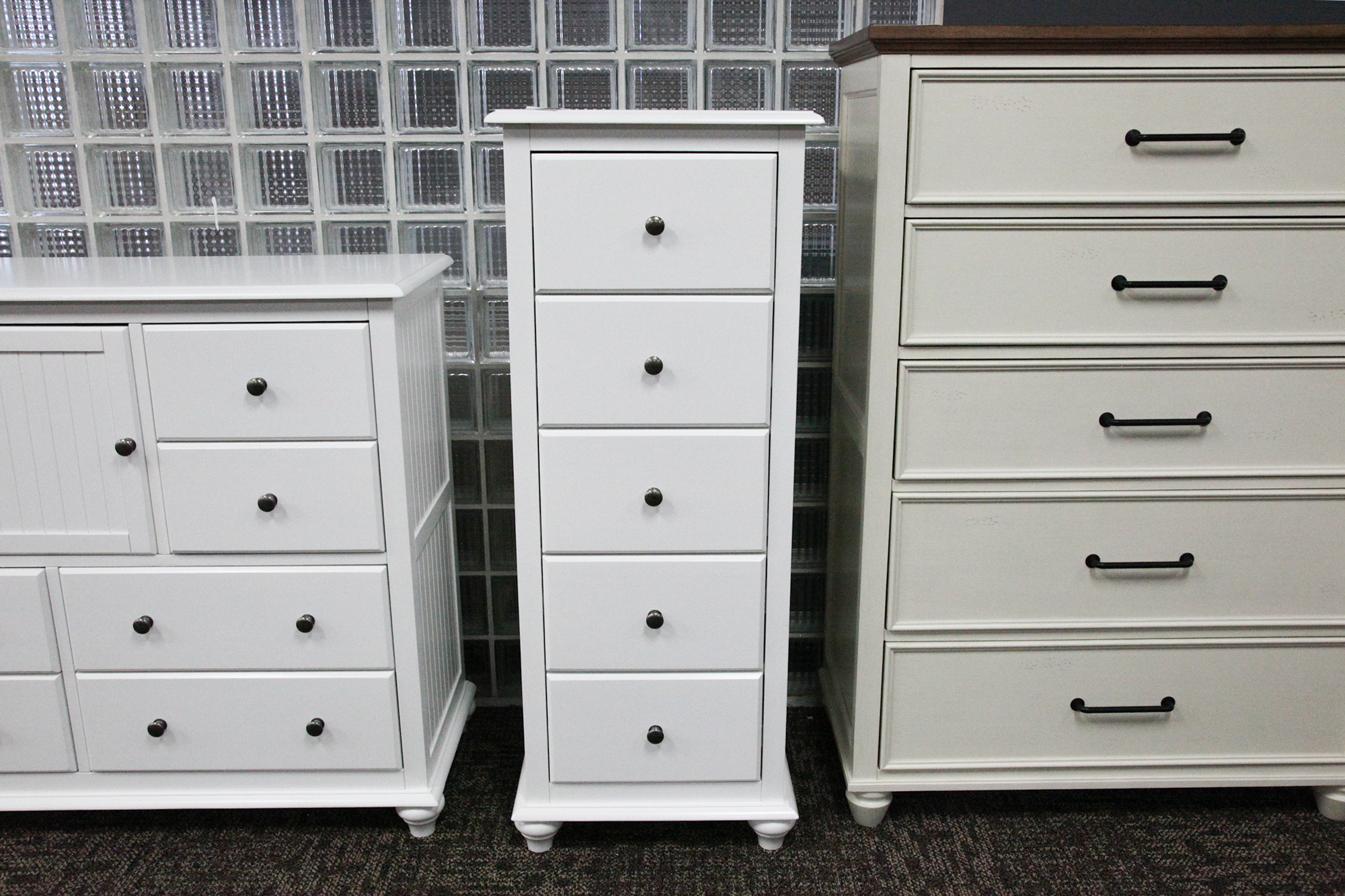 A white five-drawer lingerie chest with a narrow profile.